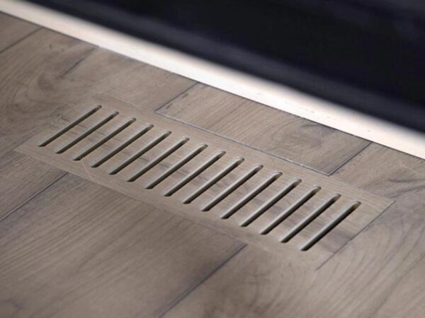 Custom Hardwood Floor Vents Turn Small Details Into Design Features